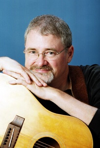 Photo of Kit Garoutte and his guitar